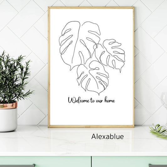 Minimalist Monstera leaf line art print with 'Welcome to our home' in modern kitchen decor
