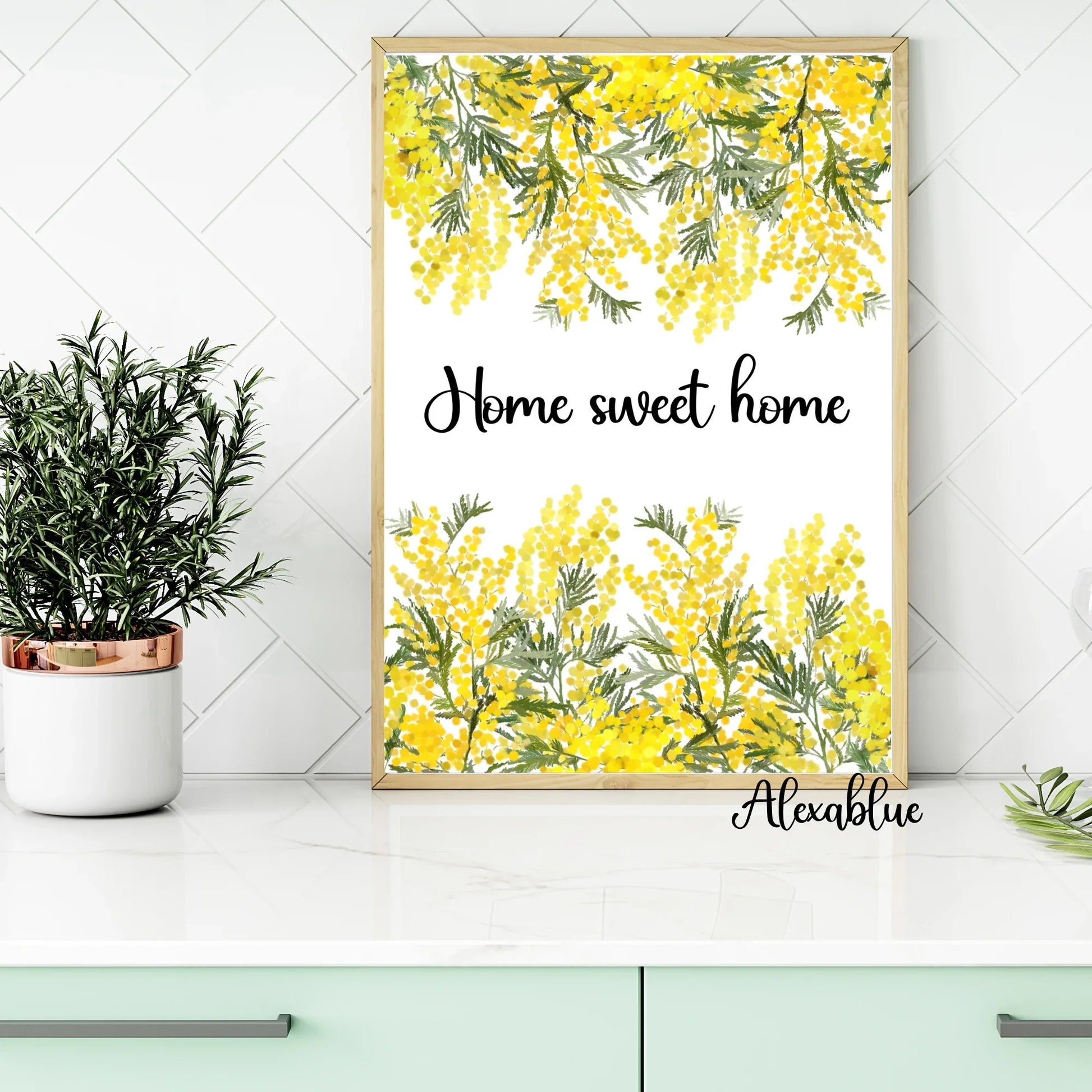 Floral kitchen decor with framed 'Home sweet home' print, yellow mimosa flowers, and potted plant.