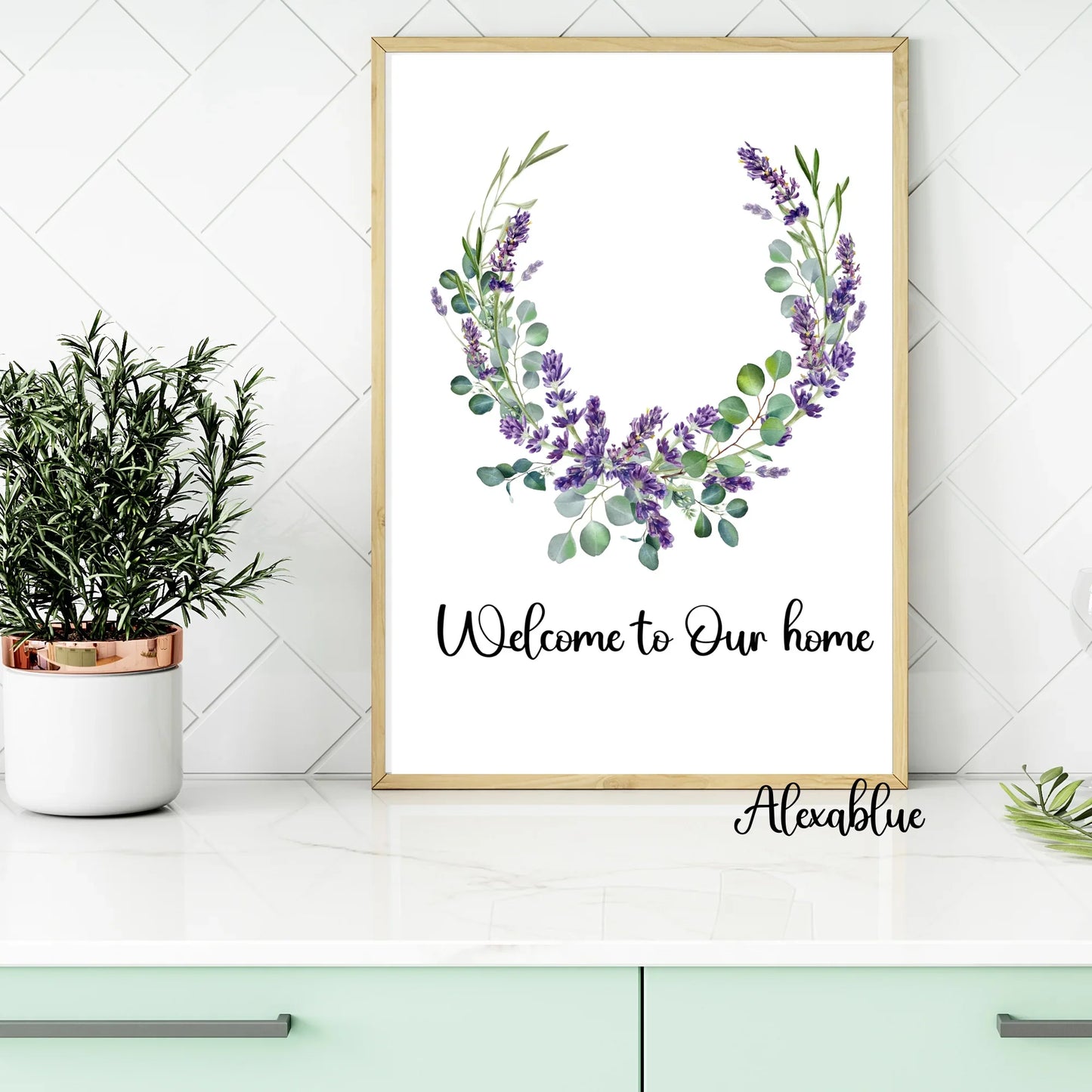 Framed botanical wall art with lavender wreath and 'Welcome to Our home' in modern kitchen decor.