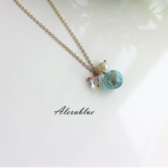 マーメイドネックレス  3月・４月誕生石　coral & crystal