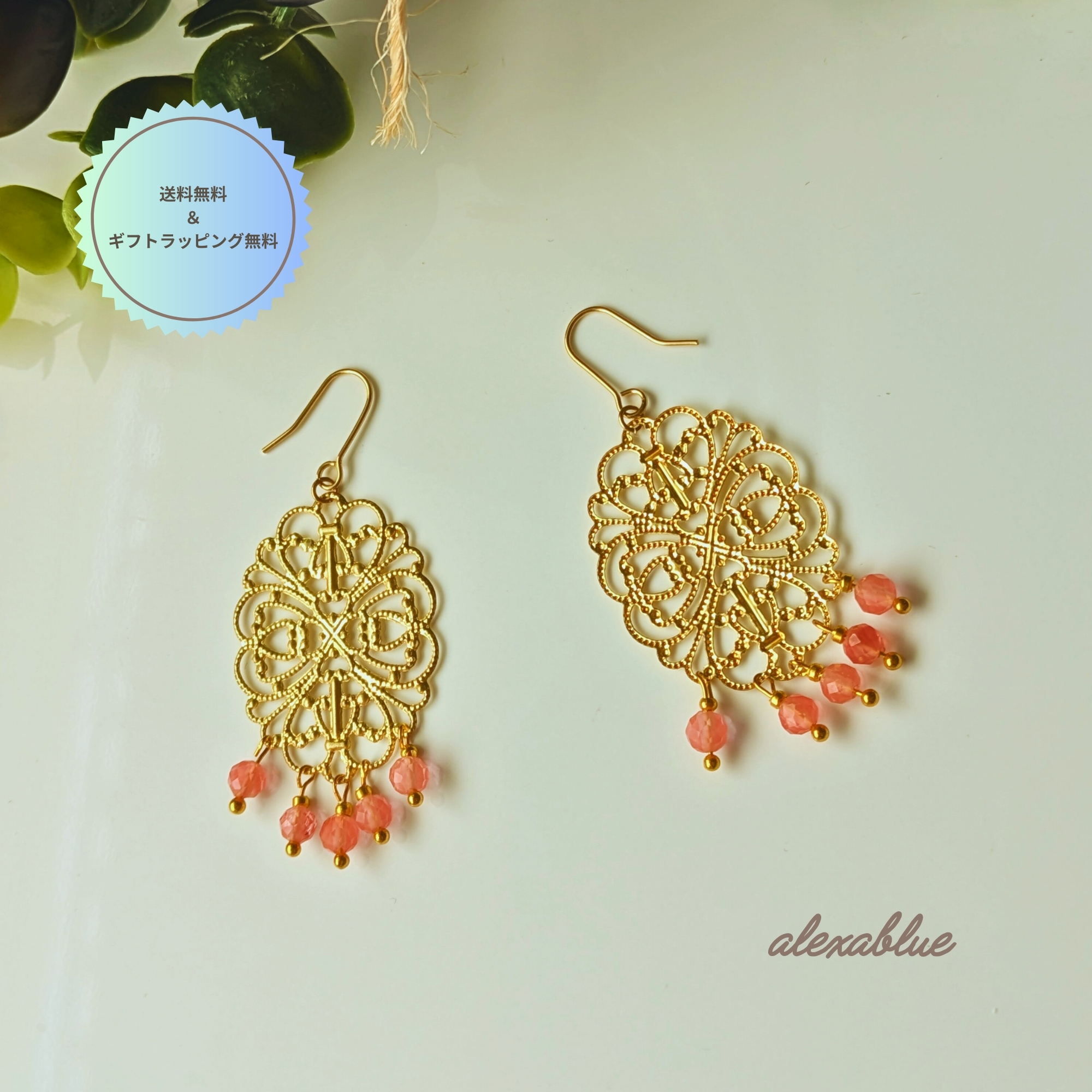 ストロベリークォーツを使用した天然石ピアス。優しいピンク色とエスニックデザインが特徴の大人可愛いピアスの全体画像